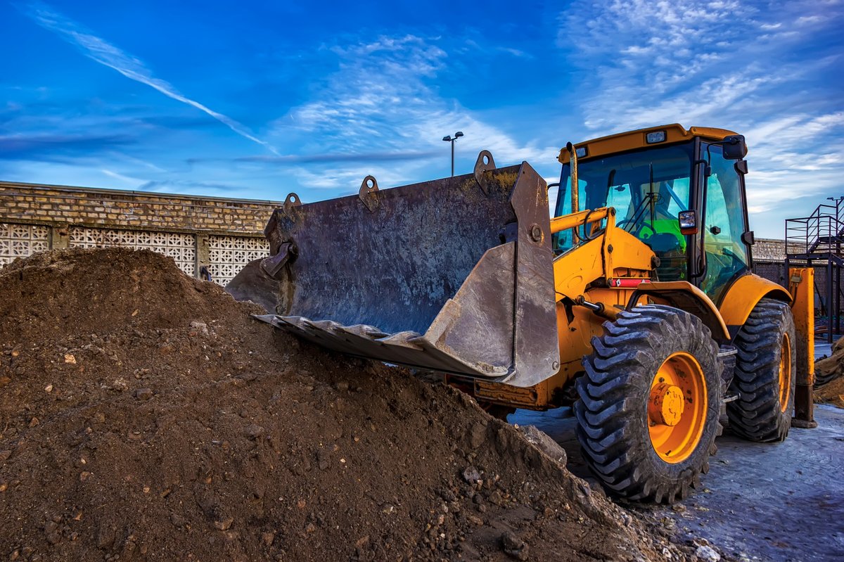 Front loader at compost site
